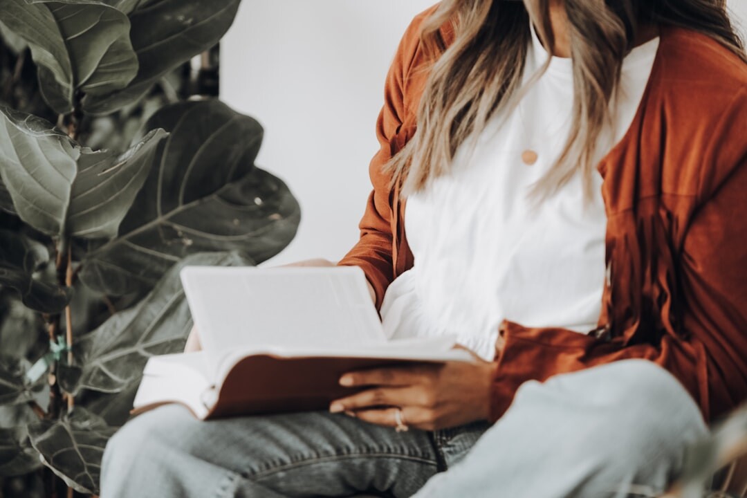 person reading mystery book